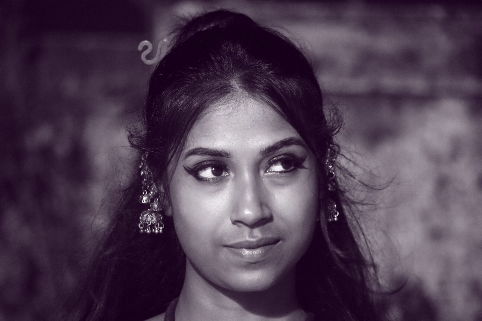 Black and white portrait of a South Asian woman from Howrah, India, outdoors.